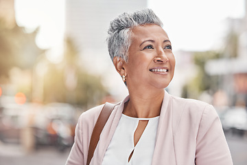 Image showing Senior woman, city smile and business person success with blurred background thinking of work. Urban, investment vision and mature female outdoor happy about investing and retirement pension ideas