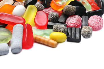 Image showing colored candies over white background