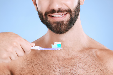 Image showing Brushing teeth, studio face and man with toothbrush, dental wellness and healthy mouth care. Happy male model, oral cleaning and smile for fresh breath, facial happiness and toothpaste for cosmetics