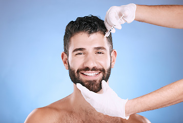 Image showing Injection, man and portrait for skincare, collagen wellness and beauty process in studio. Cosmetics, face and needle for plastic surgery of botox, facial change and aesthetic prp on blue background