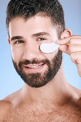 Image showing Beauty patch, eyes and portrait of man in studio for dermatology, skincare and glow. Male model, face and eye care product for body mask, healthy cosmetics and wellness of facial collagen treatment