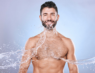 Image showing Skin care, face and water splash man portrait for clean facial for beauty hygiene and dermatology. Aesthetic model person on blue background for health and wellness cosmetics, body and detox mockup