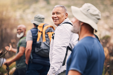 Image showing Hiking, nature and senior friends on mountain for fitness, trekking and backpacking adventure. Explorer, discovery and expedition with group of old men on trail for health, retirement and journey