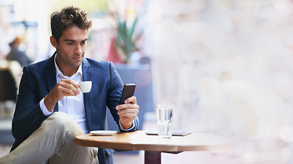 Image showing Businessman, coffee shop and phone for networking with mockup space, reading and focus at table. Man, smartphone and espresso with communication, social media app and texting on web chat ux at cafe