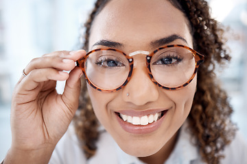 Image showing Black woman, face closeup and glasses for eye care, vision and designer frame, prescription lens and optometry. Portrait, fashion eyewear and health for eyes for wellness, smile and happy with choice