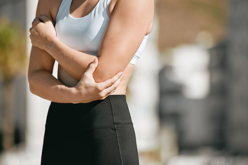 Image showing Pain, fitness and woman with broken arm after running, cardio injury and sprain after exercise in city. Bad, sports and athlete runner with a body accident, muscle strain and injured California