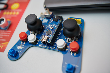 Image showing Disassembled joystick for control on the laboratory table ready to be paired with the robot