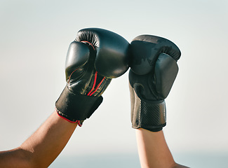 Image showing Boxer, boxing gloves and friends fist bump in celebration, collaboration and teamwork in combat sports outdoors. Fighter, hands and people training together as workout, exercise and fitness