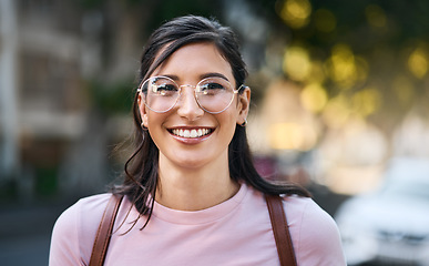 Image showing Mockup, portrait and woman in a city for travel, holiday and vacation on blurred background. Face, girl and student traveller relax downtown for fun, break and explore urban street, smile and happy