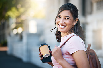 Image showing Travel, portrait and happy woman by a city building with freedom on a urban adventure in Italy. Relax, smile and morning coffee of a young person on vacation with happiness and blurred background