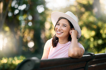 Image showing Woman, park bench and portrait of a female with bokeh in a Japanese garden with a smile from travel. Freedom, happiness and face of a Asian person on holiday feeling happy on vacation with mockup