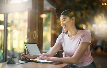 Image showing Smile, remote work or woman writing in cafe, laptop or planning research, creative idea or schedule. Happy, startup or employee girl in coffee shop with notebook and tech for social network blog news