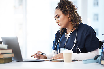 Image showing Medical, laptop and research with a woman nurse reading information in a hospital for diagnosis. Healthcare, insurance and education with a female med student working in a clinic for data analysis