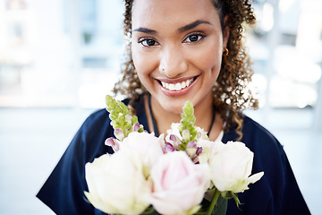 Image showing Portrait, therapist and woman with flowers or roses smile, happy and holding a gift or present feeling excited. Bouquet, happiness and medical professional in celebration for a promotion