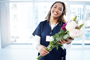 Image showing Pride, celebration and portrait of a doctor with flowers at a hospital for promotion and gift for work. Medic, happy and female nurse with bouquet as present for commitment in healthcare nursing job