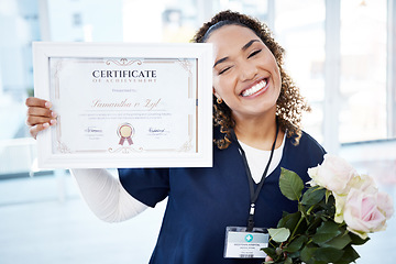 Image showing Certificate, flowers and portrait with a black woman graduate or nurse in the hospital, proud of her achievement. Smile, graduation and qualification with a happy young female standing in a clinic