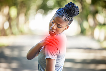 Image showing Sports, health and woman with shoulder injury, pain or accident while running in a park. Fitness, workout and African female athlete with a medical emergency or sprain muscle after a cardio exercise.