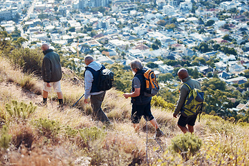 Image showing Hiking, city and group of old men on mountain for fitness, trekking and backpacking adventure. Explorer, discovery and expedition with friends mountaineering for health, retirement and journey