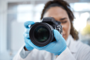 Image showing Camera, photography and lens with black woman in forensics laboratory for investigation, crime scene and evidence. Research, analytics and observation with girl and digital pictures for science