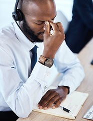 Image showing Sad, anxiety and headache by consultant worker, customer service and call center employee in office. Pain, mental health and depressed telemarketing agent overworked and frustrated at the workplace