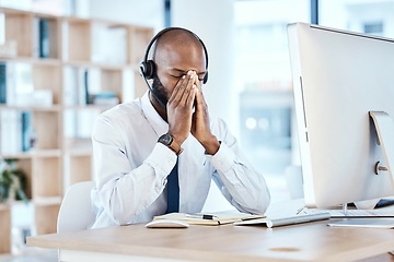 Image showing Anxiety, depression and burnout by call center worker, employee and customer service consultant in office. Pain, mental health and telemarking agent overworked and frustrated at the workplace