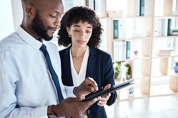 Image showing Black man, woman and tablet in office for teamwork, analysis and planning schedule at startup. Executive assistant, boss and mobile touchscreen for discussion, strategy or goal at web design company