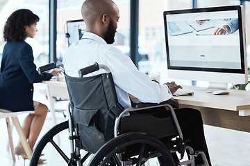 Image showing Wheelchair, office and black man disability in the workplace doing business analyst work. Working, computer and desk job of a disabled worker back planning a digital strategy for inclusive job