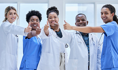 Image showing Doctors, nurses and portrait in thumbs up for teamwork, support and hospital diversity mission. Professional medical people or women with employees for healthcare like, vote or thank you emoji hands