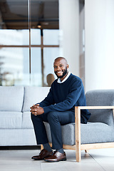 Image showing Man, happy and therapist waiting in chair at workplace for consultation or interview in an office building smiling. Portrait, employee and African American worker with positive mindset and excited