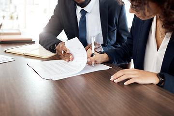 Image showing Lawyer, hands and contract with a business team at a desk in an office to sign documents. Teamwork, meeting or financial advisor with a man and woman employee signing paperwork in agreement of a deal