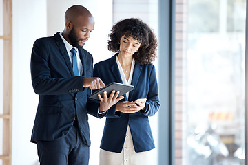 Image showing Black people, tablet and checking data, schedule or digital marketing in corporate networking at the office. Employee man and woman with touchscreen in planning for business idea or market strategy