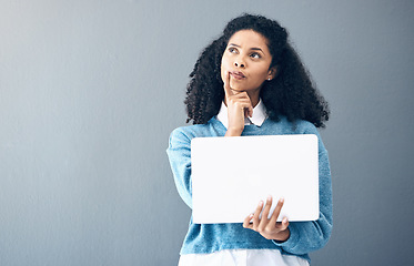 Image showing Inspiration, ideas and woman holding a laptop for an email, internet and communication on office wall. Contact, black woman and business employee thinking of motivation with a pc and mockup space