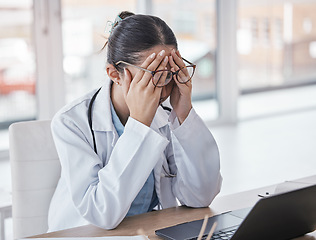 Image showing Burnout, stress or doctor woman on laptop with headache from depression, mental health or anxiety medical review. Tired, pain or sad nurse frustrated, angry or depressed for medicine report in office