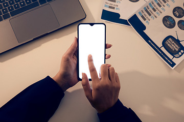 Image showing Hands, top view screen and phone mock up in office for branding, web browsing or social media. Technology, mockup and female employee or woman with mobile smartphone for marketing or advertising.