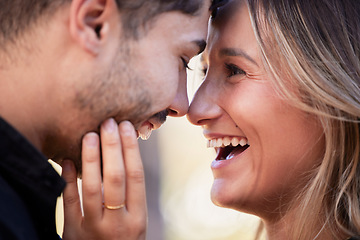 Image showing Couple, forehead touch and laugh together with happiness, comic moment or romance outdoor for date. Man, woman and funny time with love, care or happy in nature closeup with hand, face and crazy joke