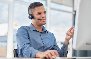 Image showing Customer support, call center and male telemarketing consultant doing a consultation online. Contact us, communication and man customer service agent with a headset working on crm strategy in office.