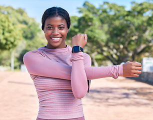 Image showing Portrait, black woman outdoor and stretching, training and fitness with smile, wellness and healthy lifestyle. Face, African American female athlete or happy lady stretch arms, practice and in nature