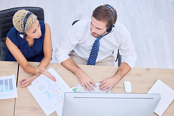 Image showing Call center, collaboration and overhead with a woman supervisor training a man employee in a telemarketing office. Customer care, teamwork and support with a female agent teaching a male colleague