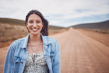 Image showing Woman, portrait smile and countryside travel for holiday break, vacation or road adventure journey in the outdoors. Happy female traveler smiling for fun traveling in joy for outing in dessert safari