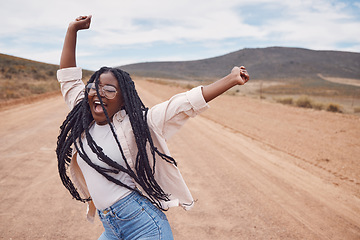 Image showing Freedom, excitement and mockup with a black woman dancing in the desert for fun during a road trip. Travel, dance and mock up with a young female enjoying her holiday or vacation outside in nature