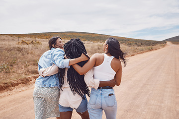 Image showing Woman, friends and walking in hug for countryside travel, adventure or vacation trip together outdoors. Happy women hugging and taking a walk enjoying social life and traveling in dessert safari