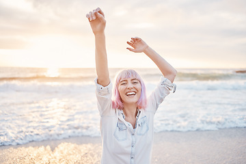 Image showing Sunset, beach and portrait of excited woman having fun in waves while on holiday in Indonesia. Smile on face, freedom and travel, happy gen z girl playful on summer ocean vacation with evening dance.