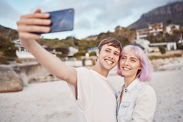 Image showing Selfie, love and couple on the beach for a date, travel memory and quality time in Bali. Freedom, care and happy man and woman taking a photo while walking by the ocean during a vacation together