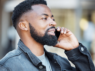 Image showing Phone call, face and talking in the city with a black man closeup outdoor for wireless communication. 5g mobile technology, networking and chatting with a handsome young male outside in an urban town