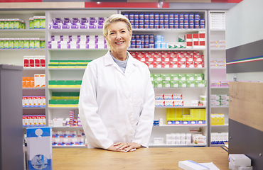 Image showing Pharmacy, smile and portrait of woman at counter in drugstore, happy customer service and advice in medicine. Prescription drugs, pharmacist and inventory of pills and medicine at checkout in store.