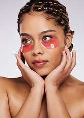 Image showing Beauty, eye mask and skin care for a black woman in studio for spa cosmetics and dermatology. Face of aesthetic model person on a white background with facial collagen gel patch for wellness glow