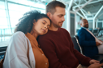 Image showing Airport, travel and woman sleeping by her boyfriend while waiting to board their flight together. Tired, exhausted and female taking a nap for rest on the shoulder of her man in the terminal lounge.