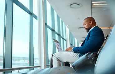 Image showing Travel, laptop and website with black man in airport for online booking, vip lounge and communication. Relax, internet and technology with businessman reading on layover for vacation, trip and flight