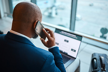 Image showing Phone call, laptop and man at airport with travel agency website, schedule and communication services. African business person in waiting room or lobby with suitcase, smartphone and booking online