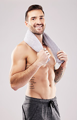 Image showing Body, man in portrait and fitness with beauty, grooming and hygiene with health and clean on studio background. Happy, topless male with towel and cosmetics with bodybuilder, exercise and muscle